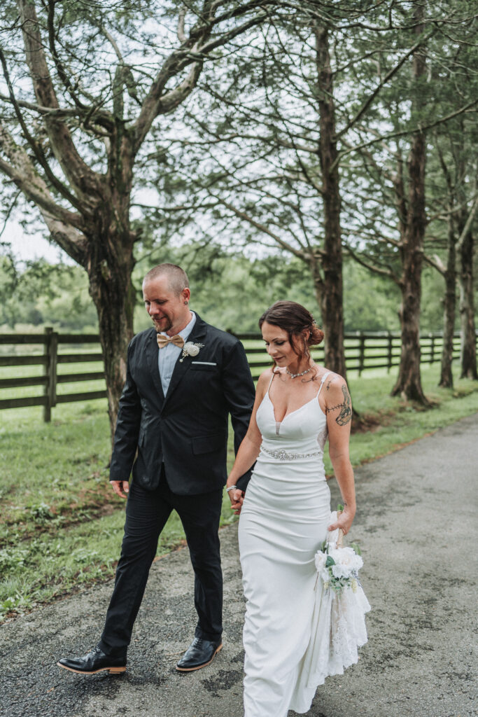 Bride and groom walking side by side during their bridal portraits- Quinn Photography LLC