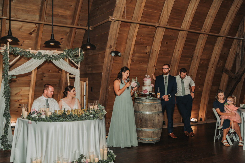 Emotional toast during barn wedding reception