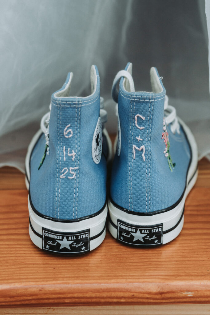 Custom embroidered blue Converse sneakers with wedding date and initials, photographed at Due Sorelle in Buckingham County, Virginia by Quinn Photography LLC.